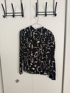 Zara Black Long-Sleeve Top with White Abstract Face Print